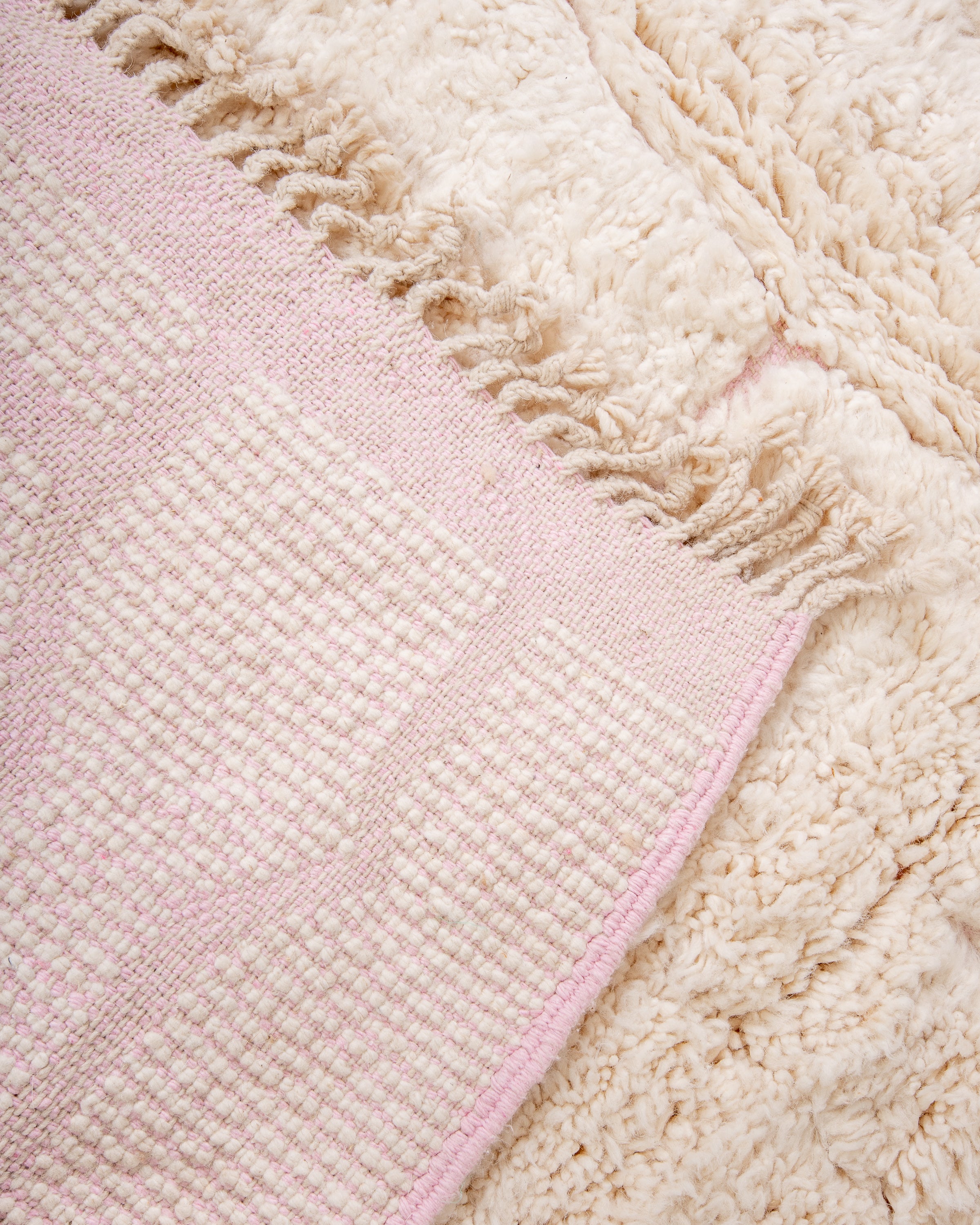 Modern, designer, handcrafted Berber rug from Morocco. Beniourain carpet with beautiful colors and patterns and fluffy wool texture.